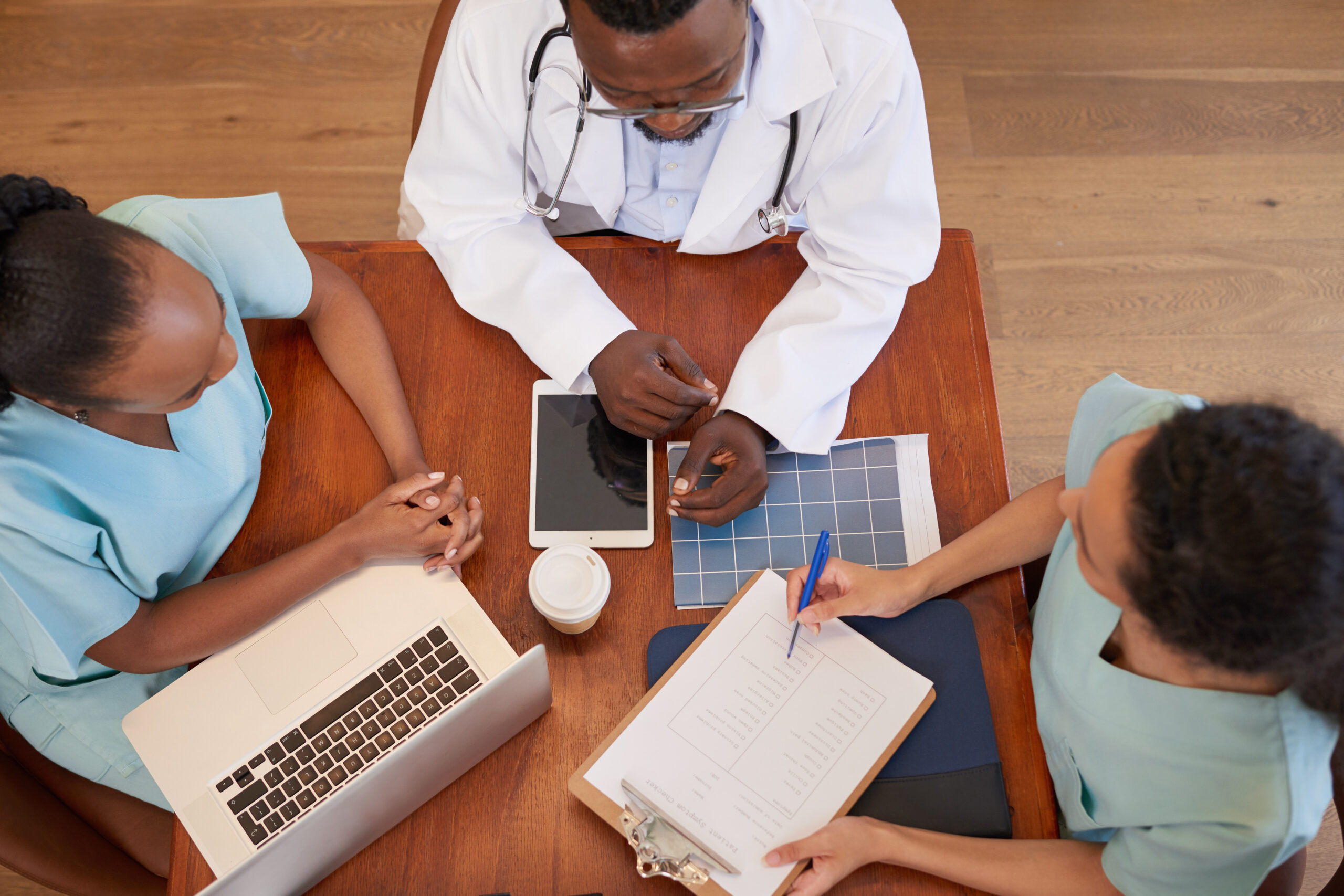 Overhead shot of medical team meant to convey the CMS administrator and healthcare management