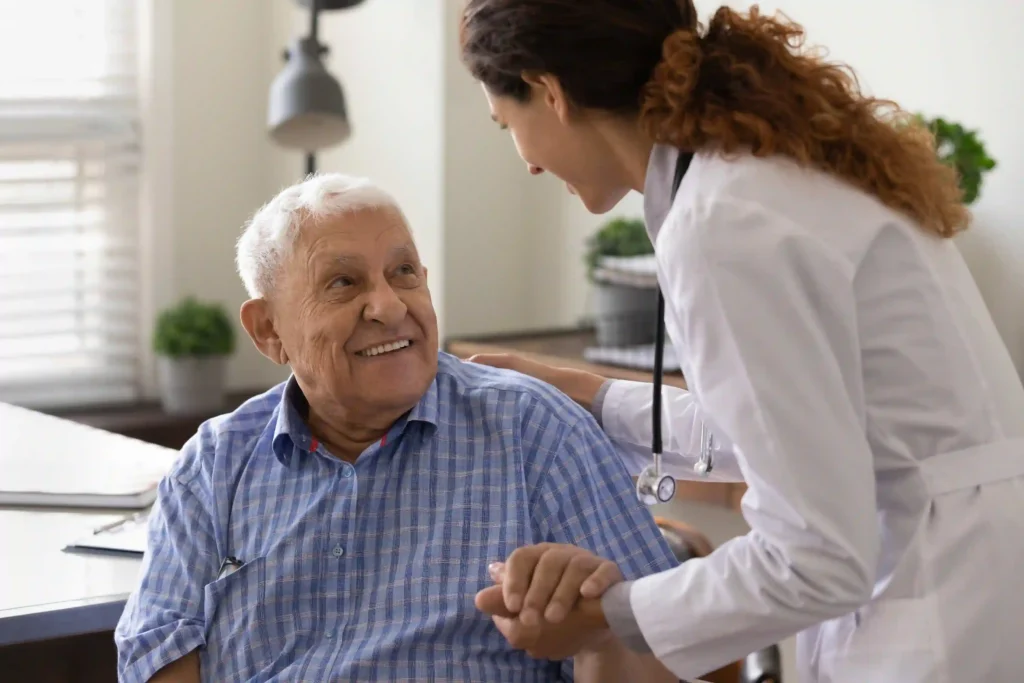 A senior man receiving assistance from a healthcare provider, concept for finding care managing chronic conditions